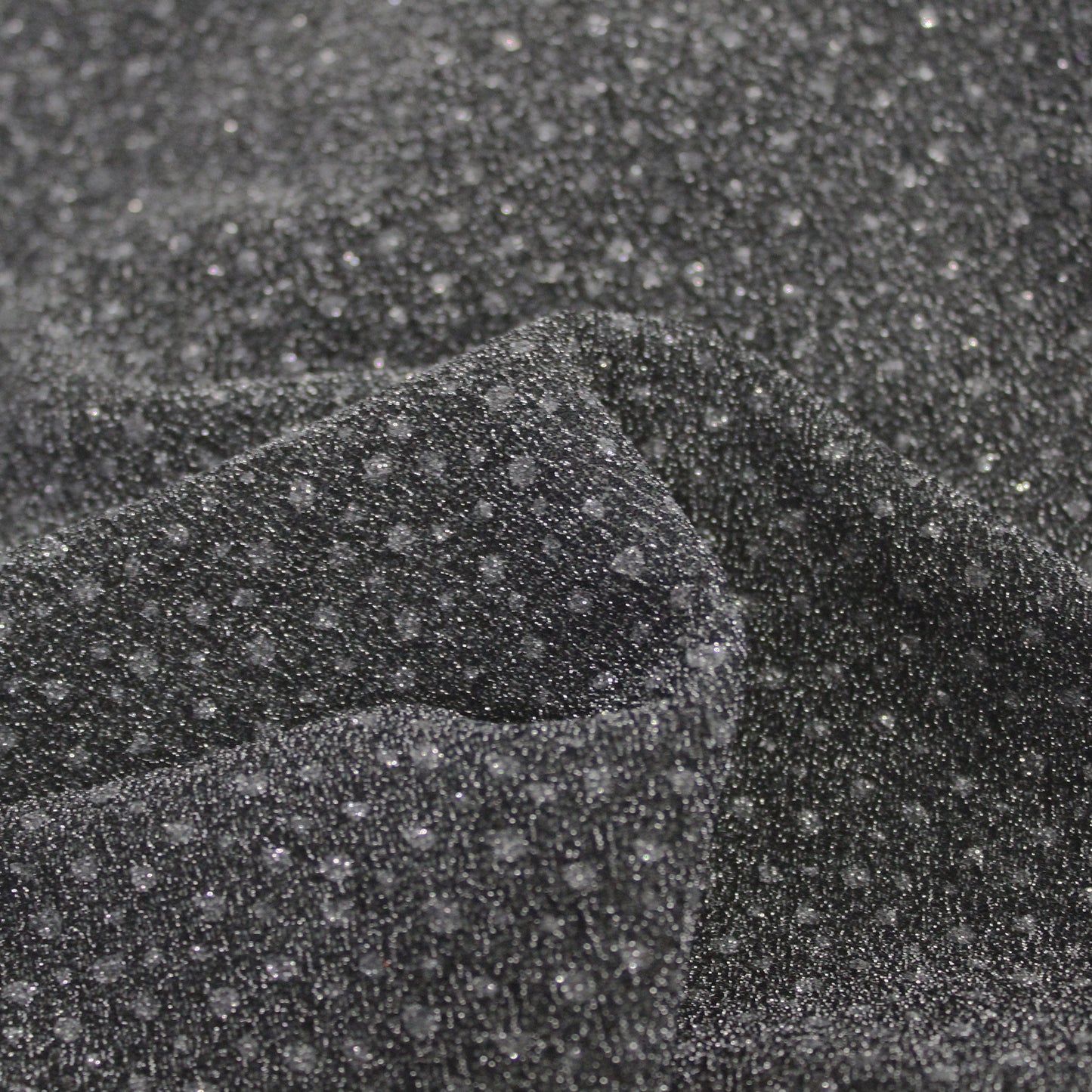 Tessuto Jersey Elasticizzato con Pois Glitter Tono su Tono
