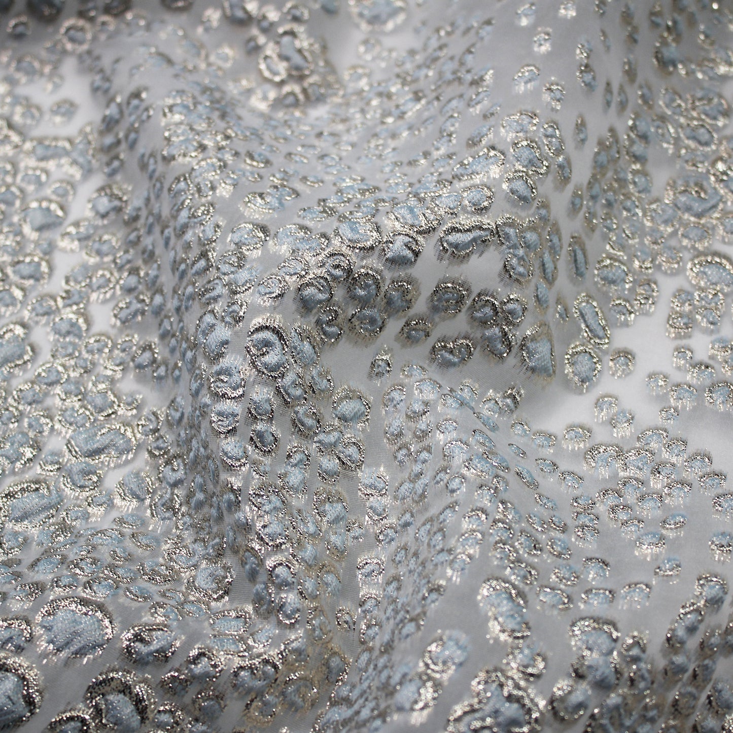 Tessuto Broccato con Effetto Pelle di Leopardo