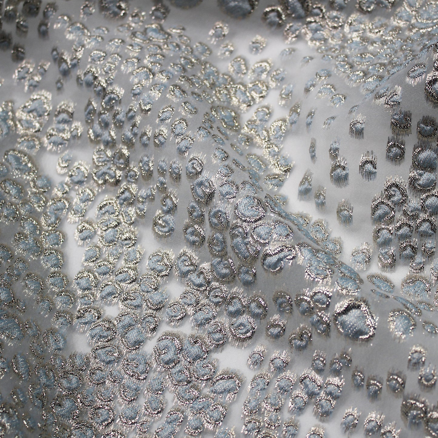 Tessuto Broccato con Effetto Pelle di Leopardo