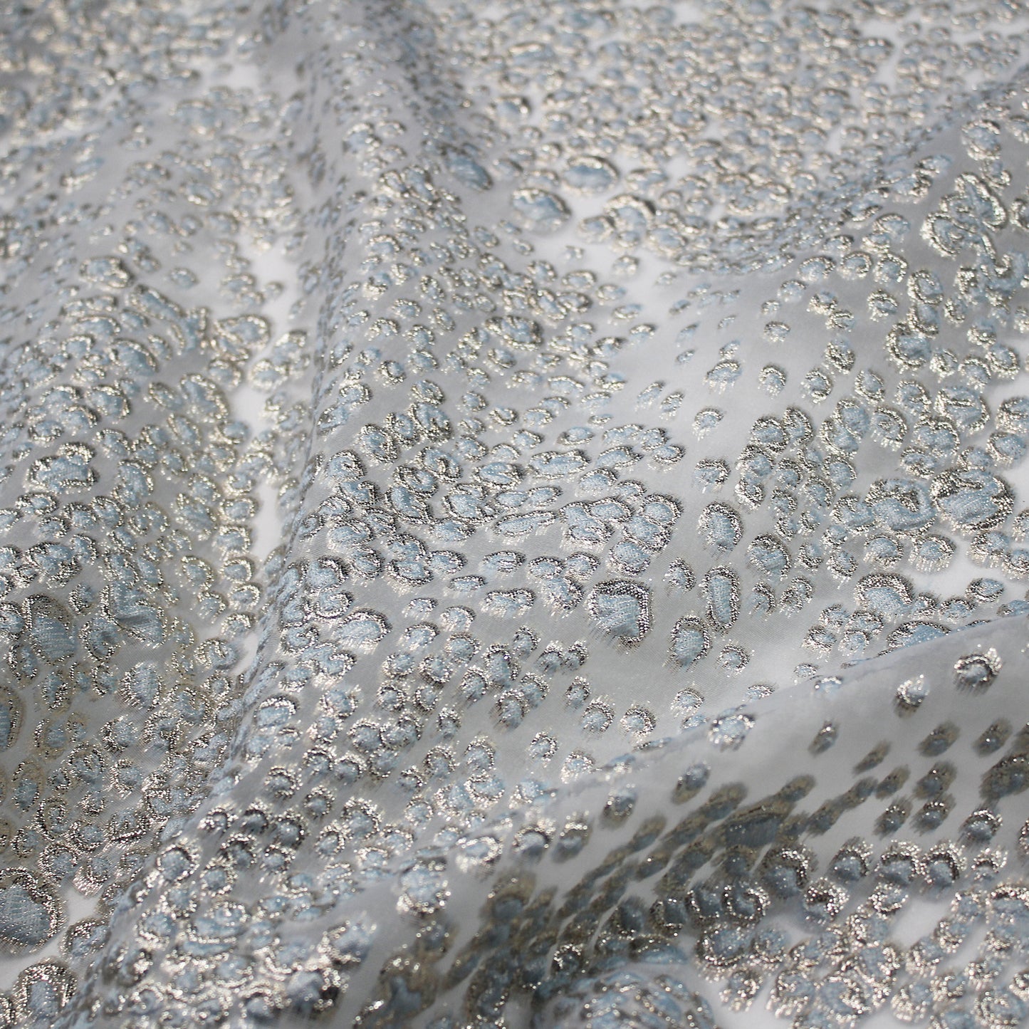 Tessuto Broccato con Effetto Pelle di Leopardo