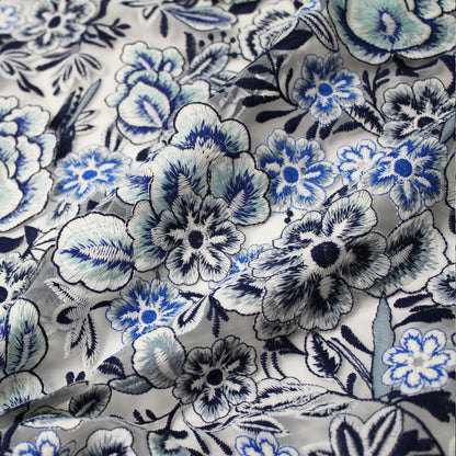 White Embroidered Tulle with Raised Blue Flowers