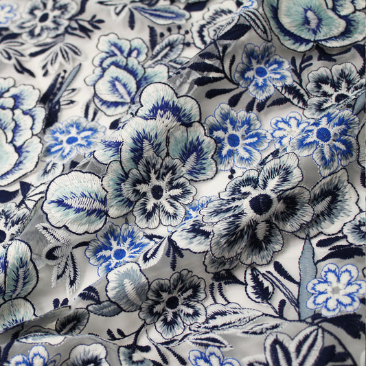 White Embroidered Tulle with Raised Blue Flowers