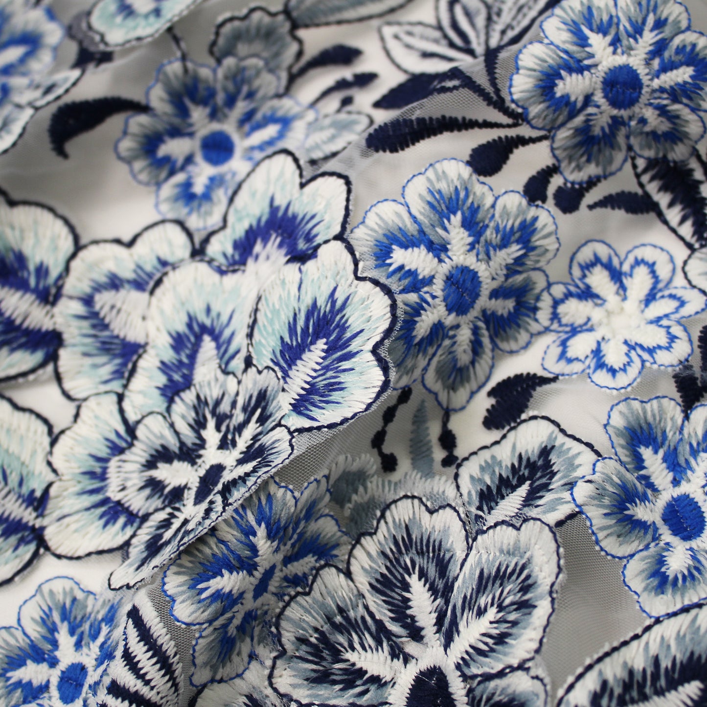 White Embroidered Tulle with Raised Blue Flowers