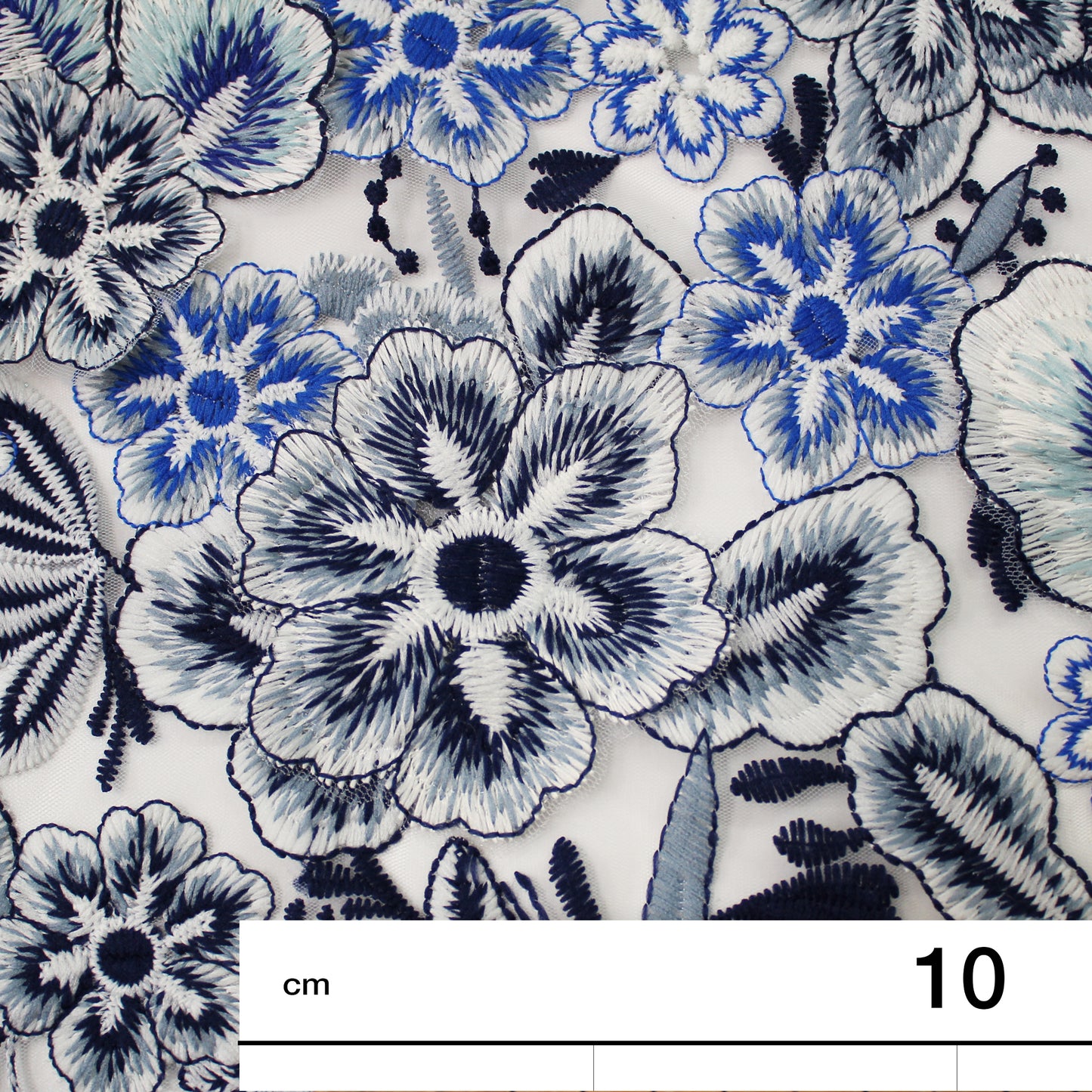 White Embroidered Tulle with Raised Blue Flowers